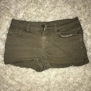 Green shorts, folds on the legs!